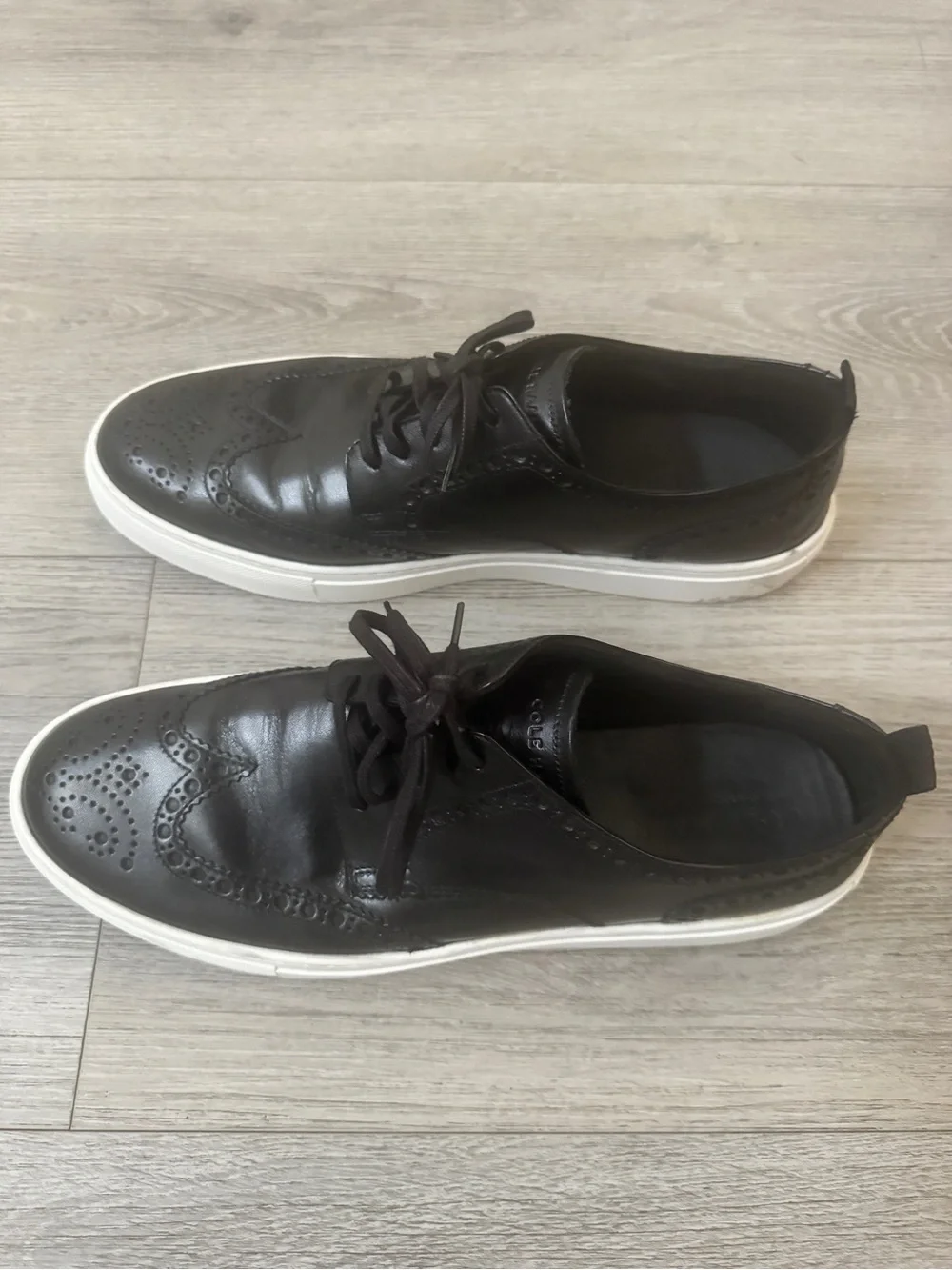 Cole Haan Men's Black Leather Wingtip Sneakers with White Sole size 12m